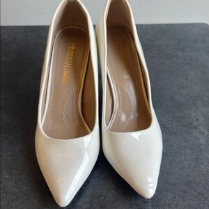 Elegant White Pumps